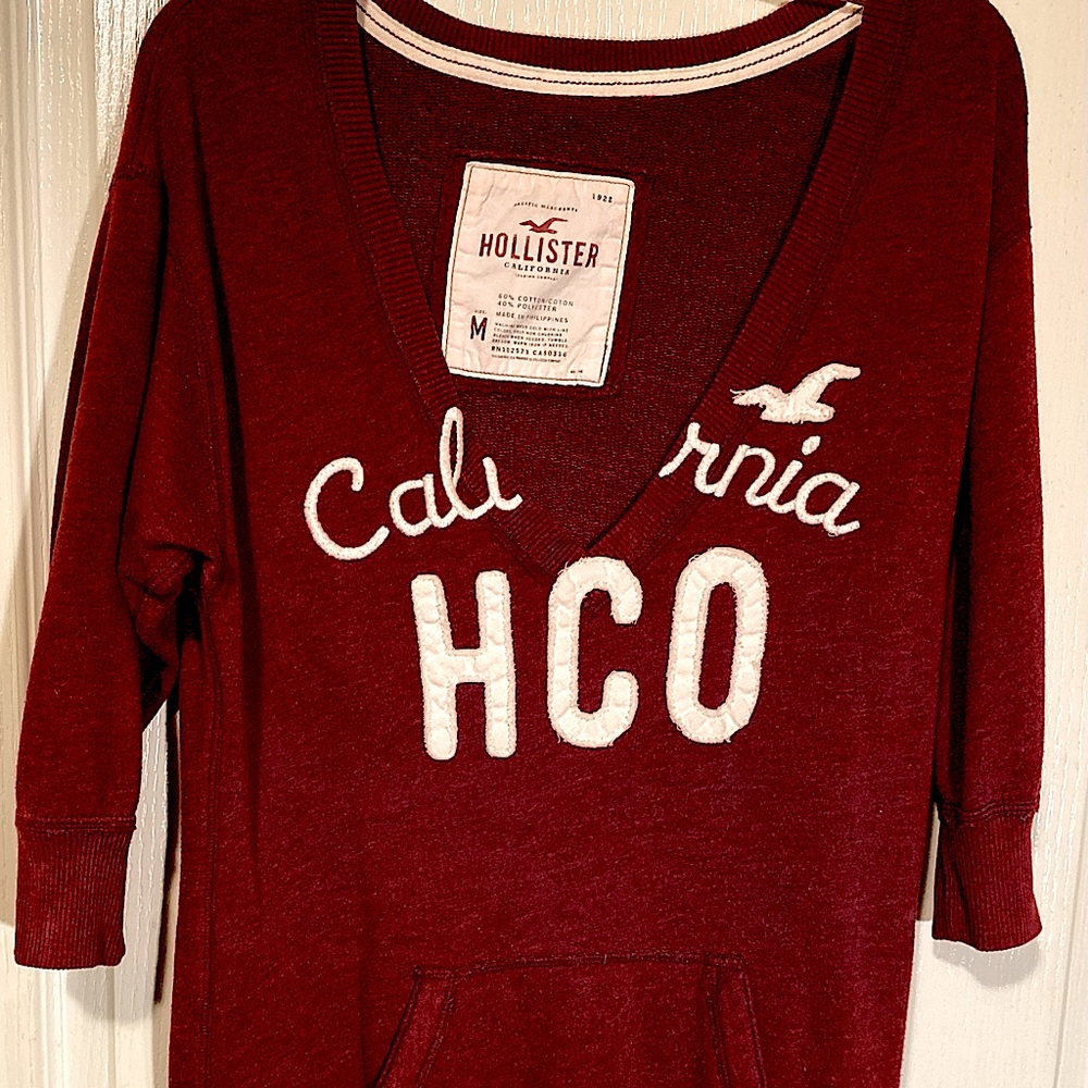 Vintage Hollister v neck sweat shirt in a deep burgundy . Size medium . Sold !